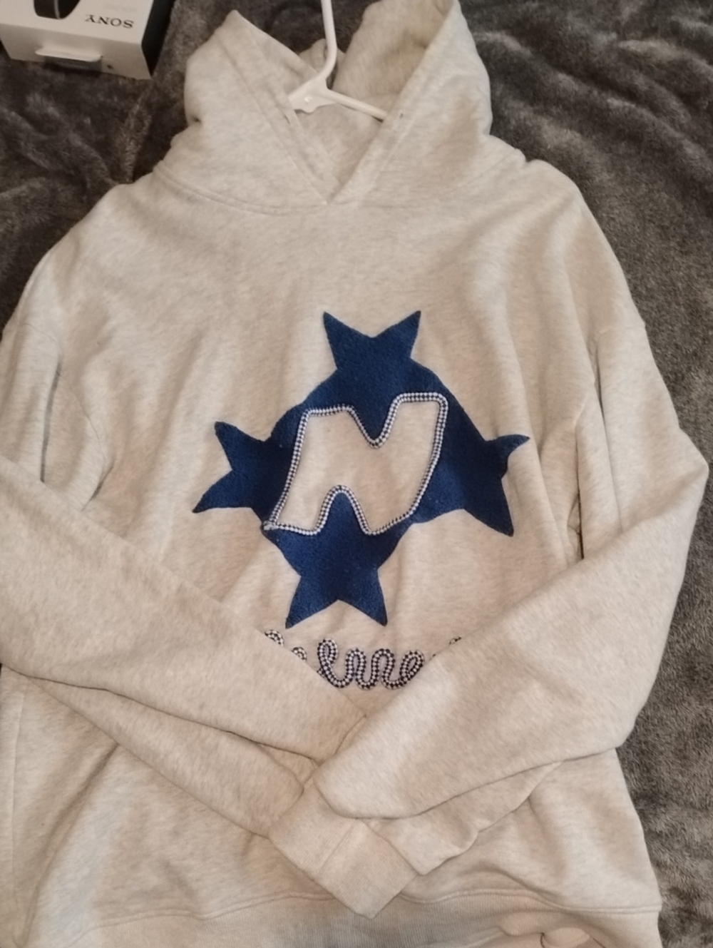 Light Gray Hoodie with Blue Star Patch